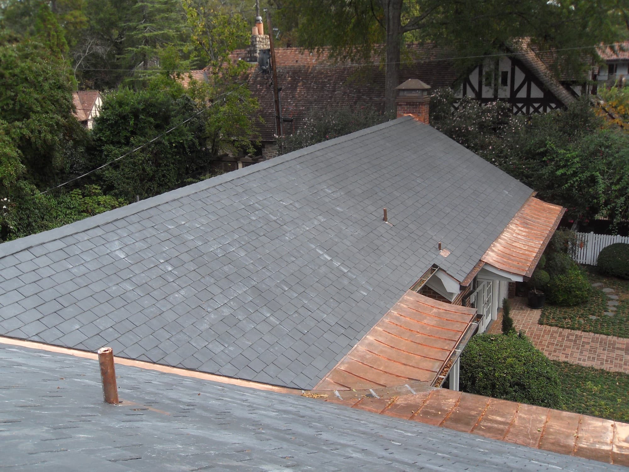 Slate roofing with copper accents
